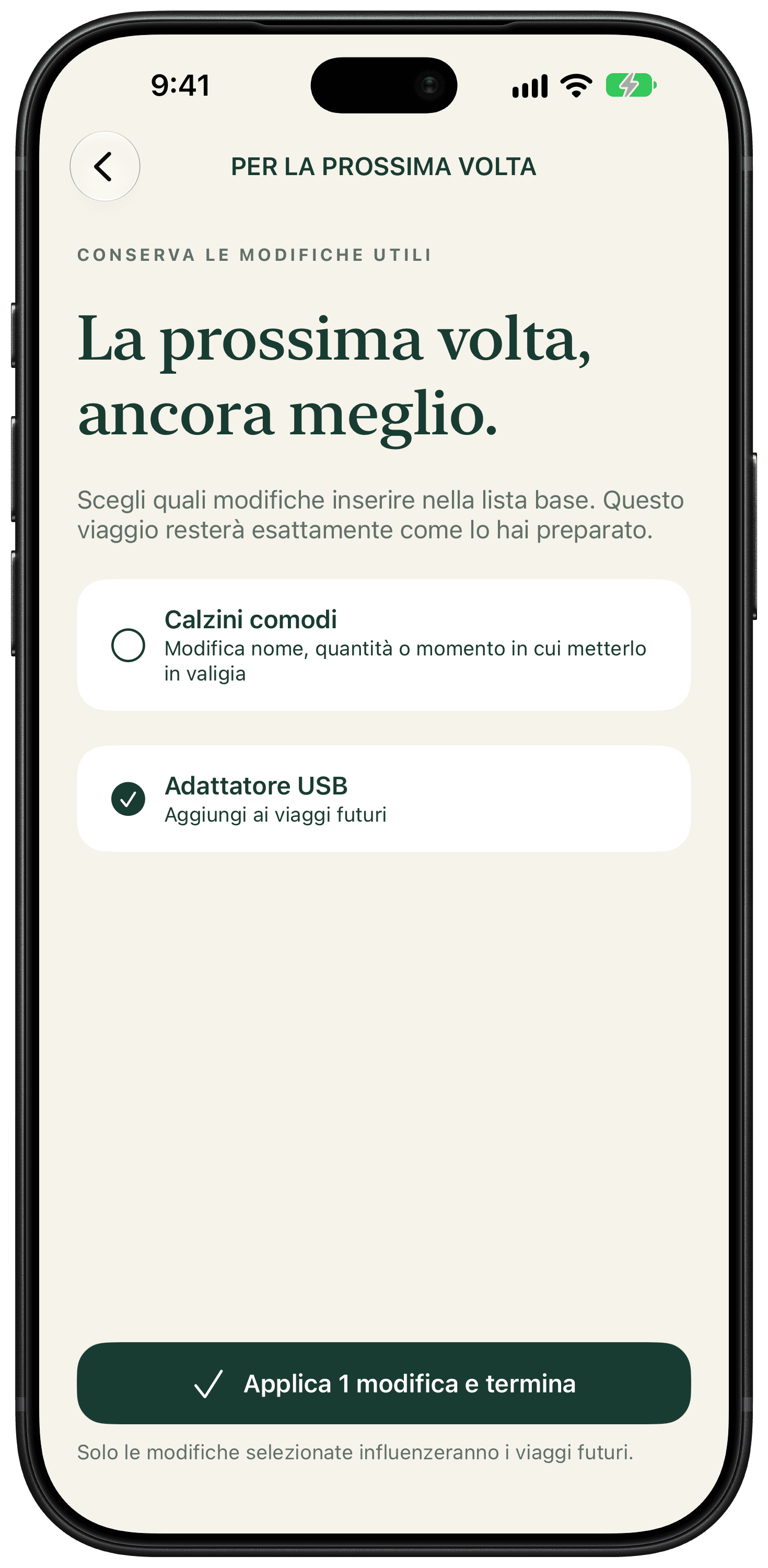 La revisione per il prossimo viaggio mostra ogni modifica; l’adattatore USB è selezionato per aggiornare la lista base.